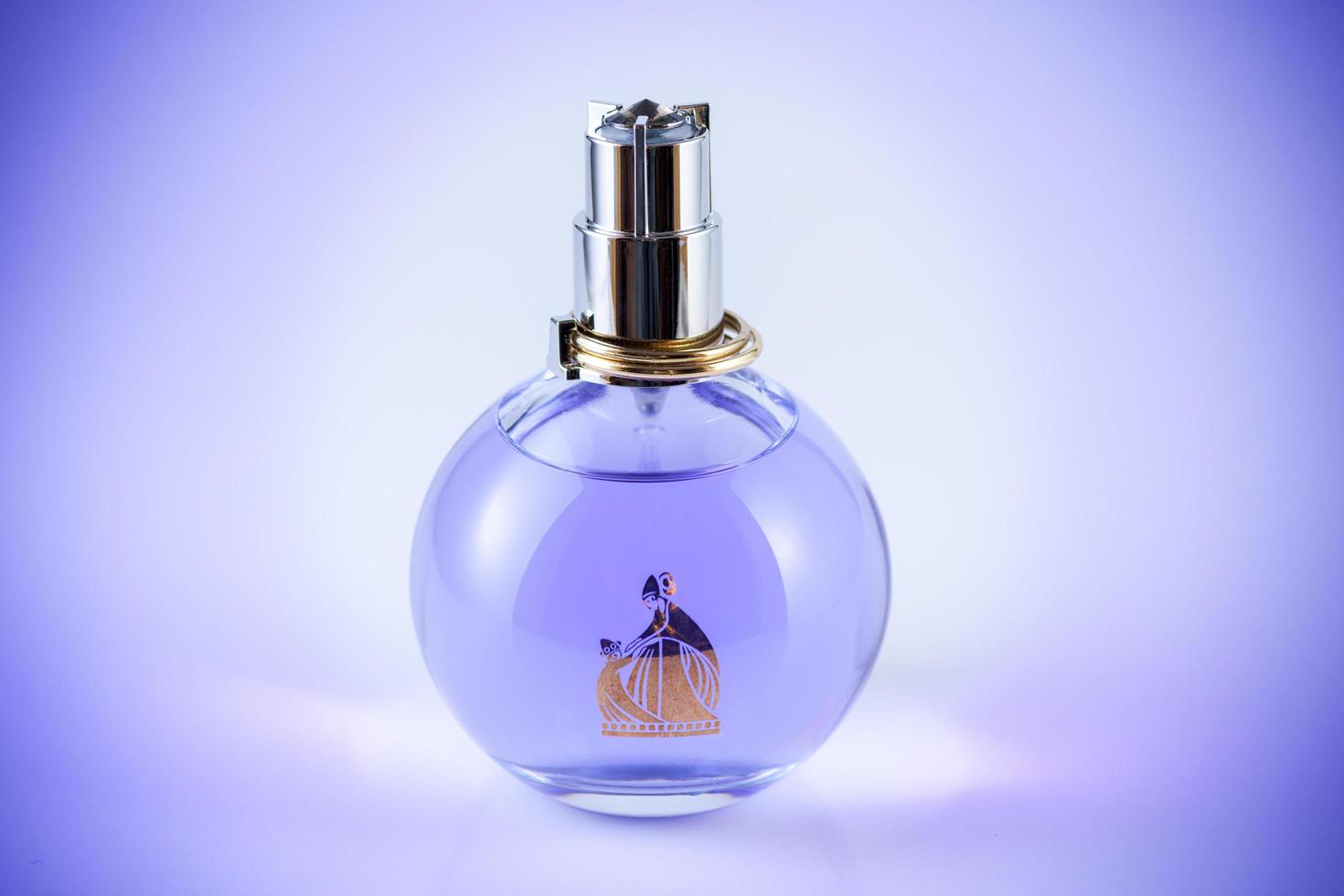Chelyabinsk, Russia, December 23, 2019. Lanvin Eclat D'arpege perfume transparent bottle on white background. photo