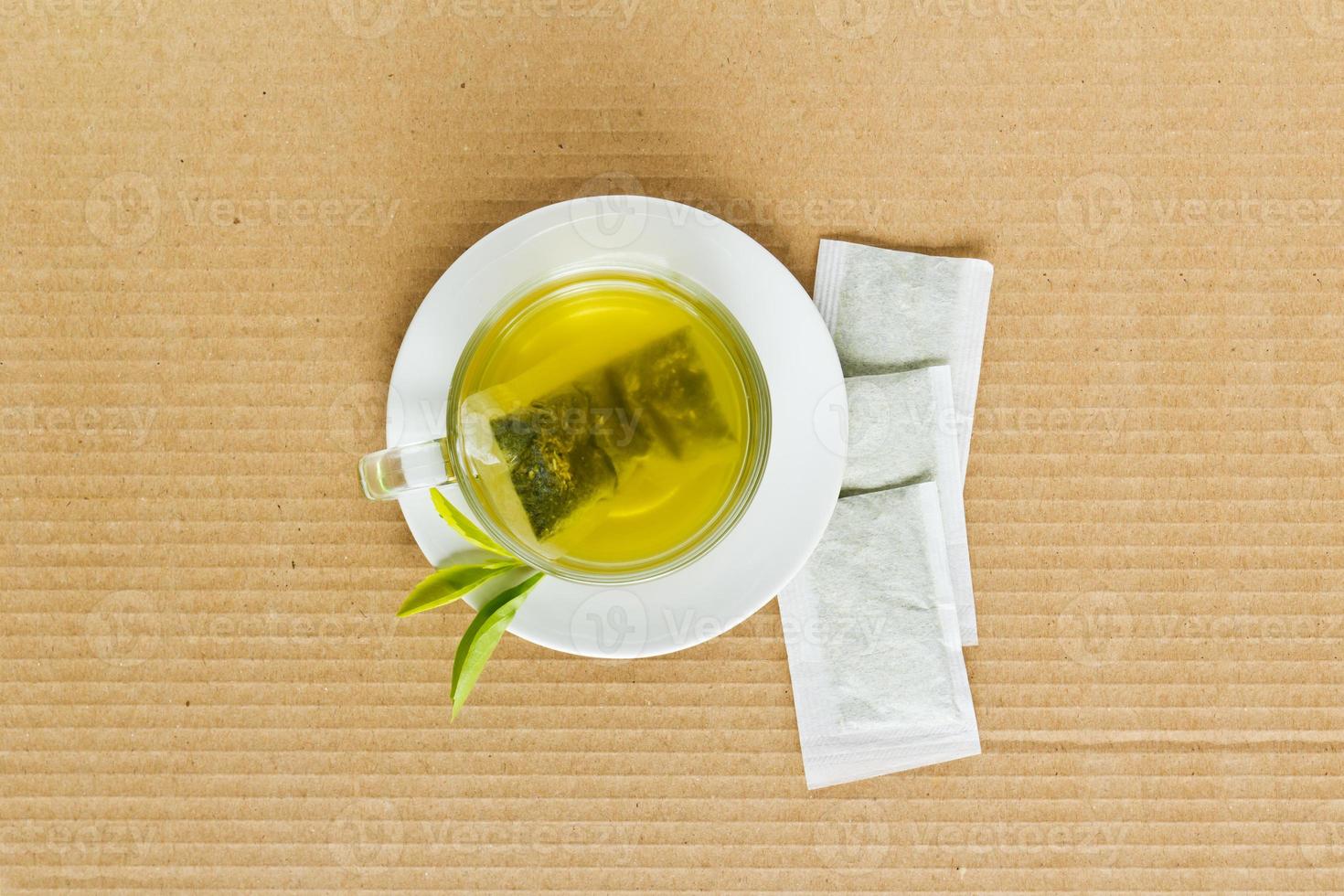 Green tea in a white cup photo