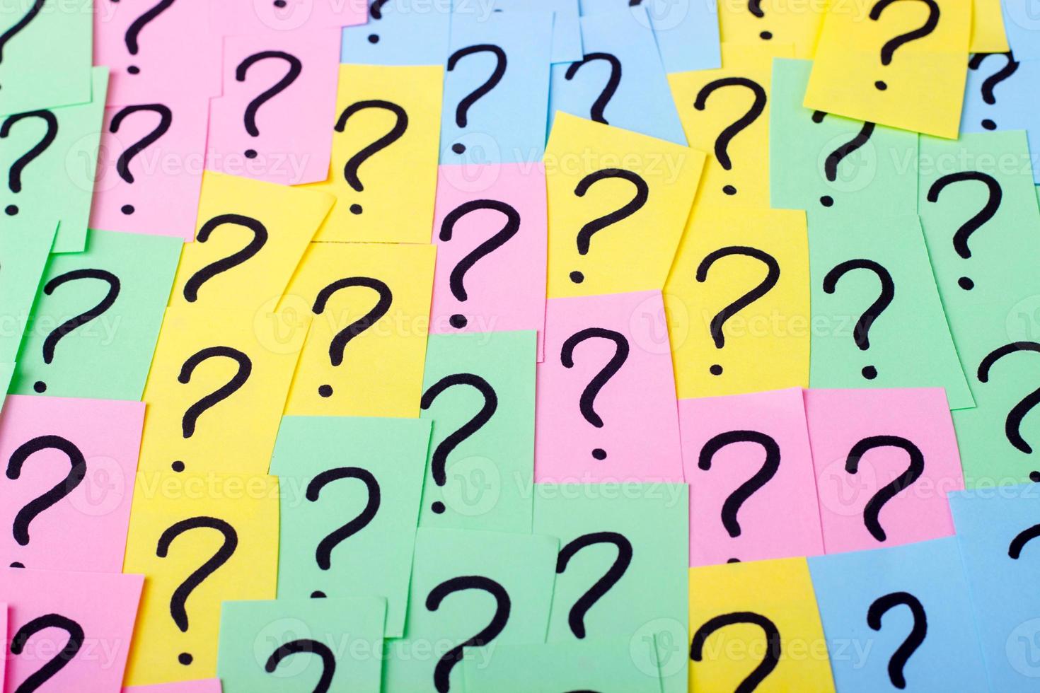 Question marks. Colorful paper notes with question marks. Concept image. Closeup. photo