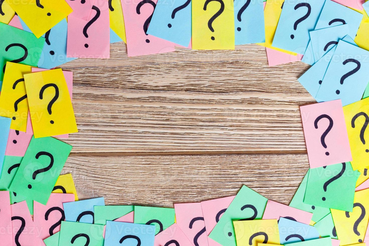 colorful question marks frame background written reminders tickets. ask or business concept with copy space photo