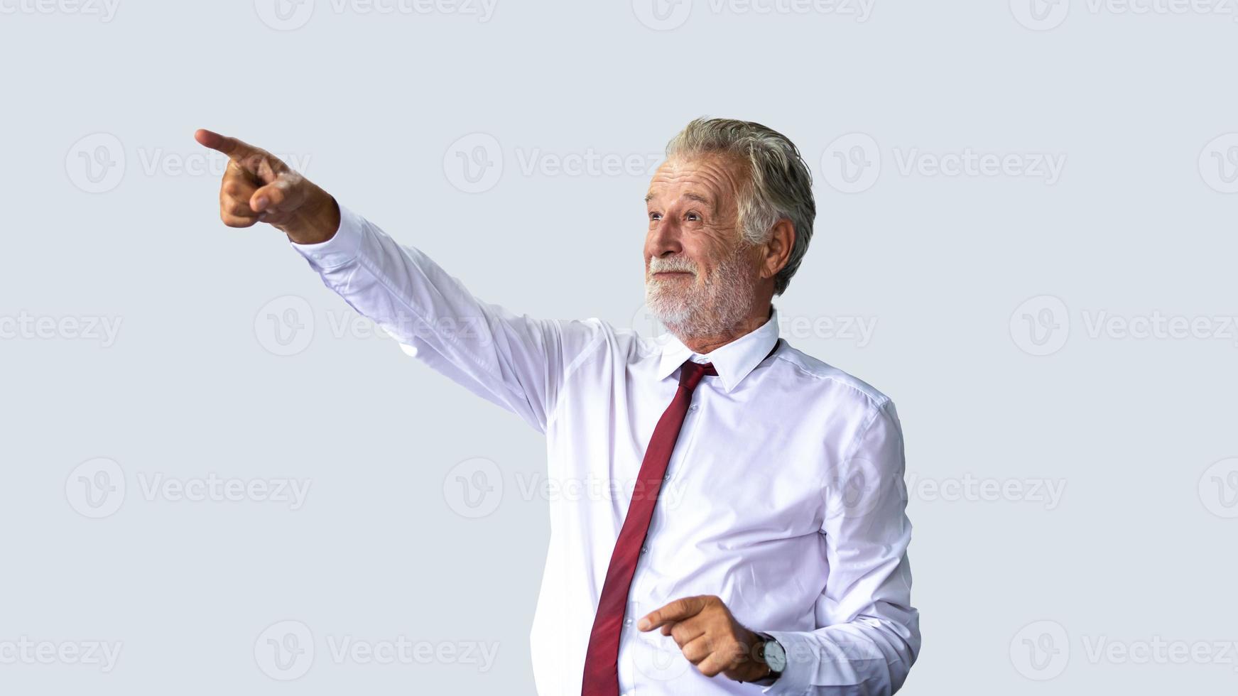 Elderly business man standing confidently smiling and laughing happy in the meeting room photo