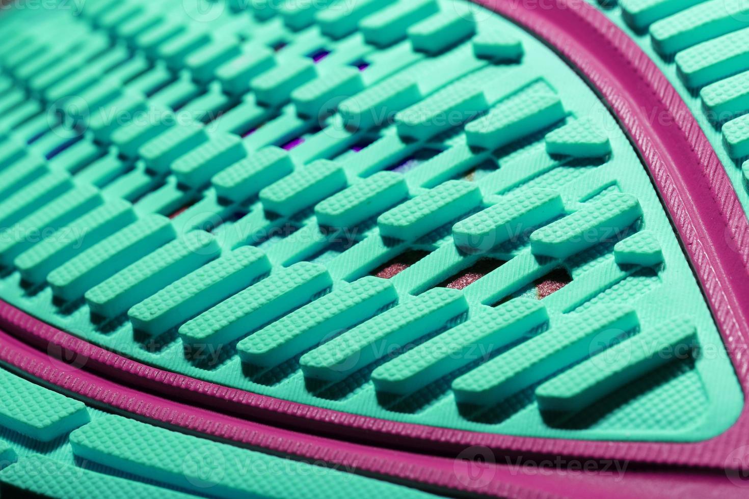 Turquoise outsole tread with sports sneakers for jogging and fitness. Sports style, close-up photo