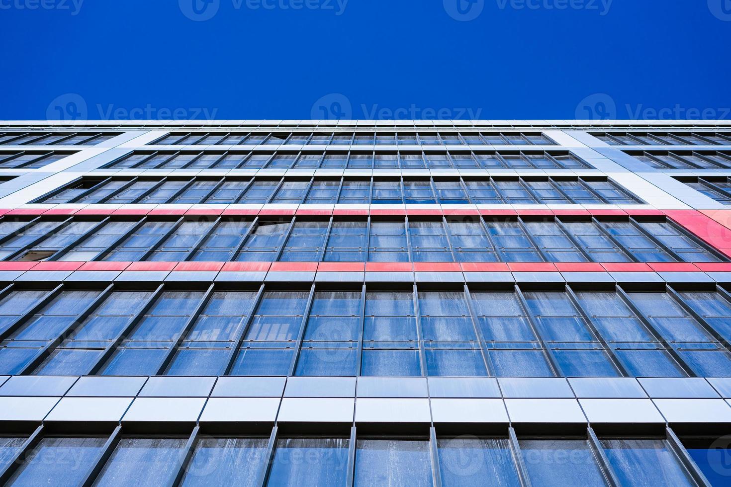 glass facade of the house against the sky photo