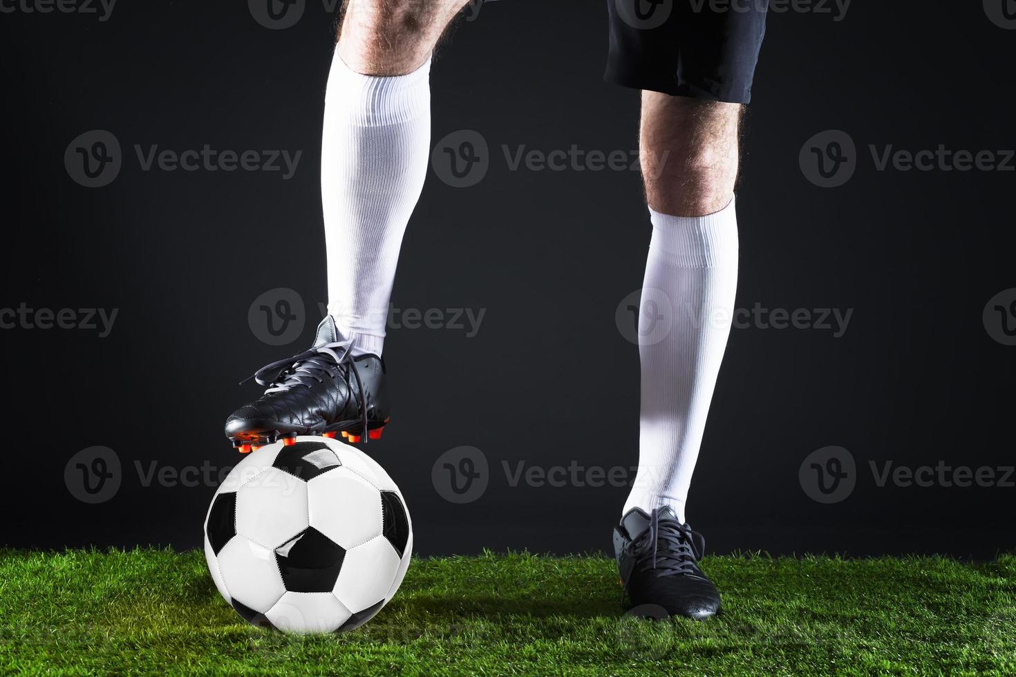 Football. Soccer. Soccer player dribbling with ball photo