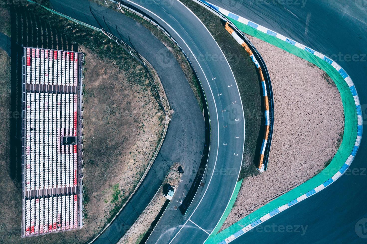 Aerial top down drone view of a racing track with tight turns and hairpins photo