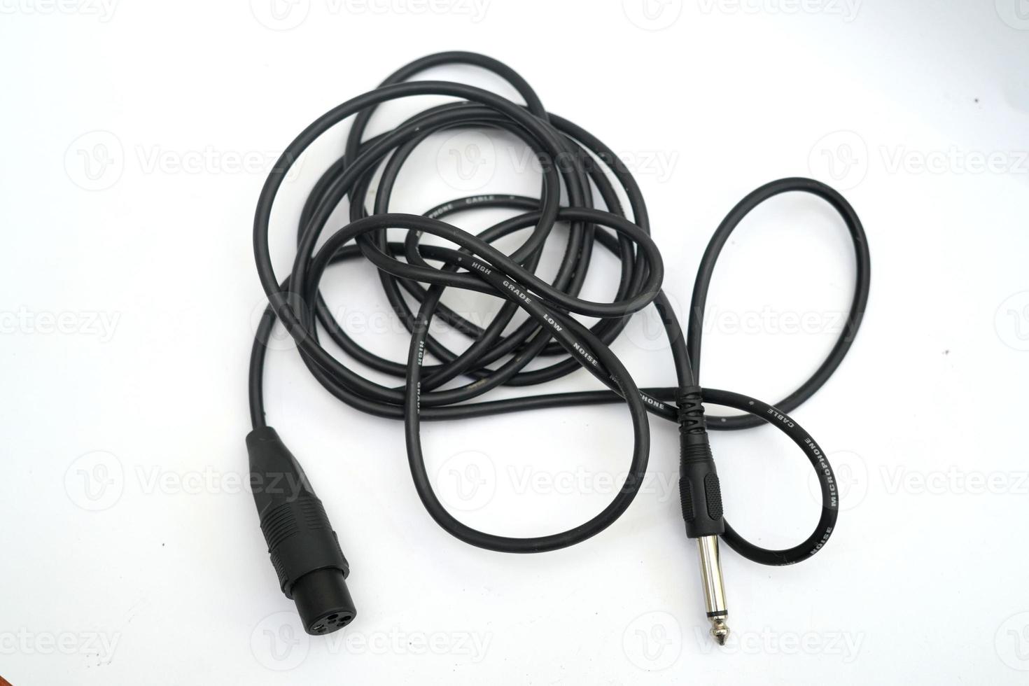 jack akai to jack canon with black cable and white background photo