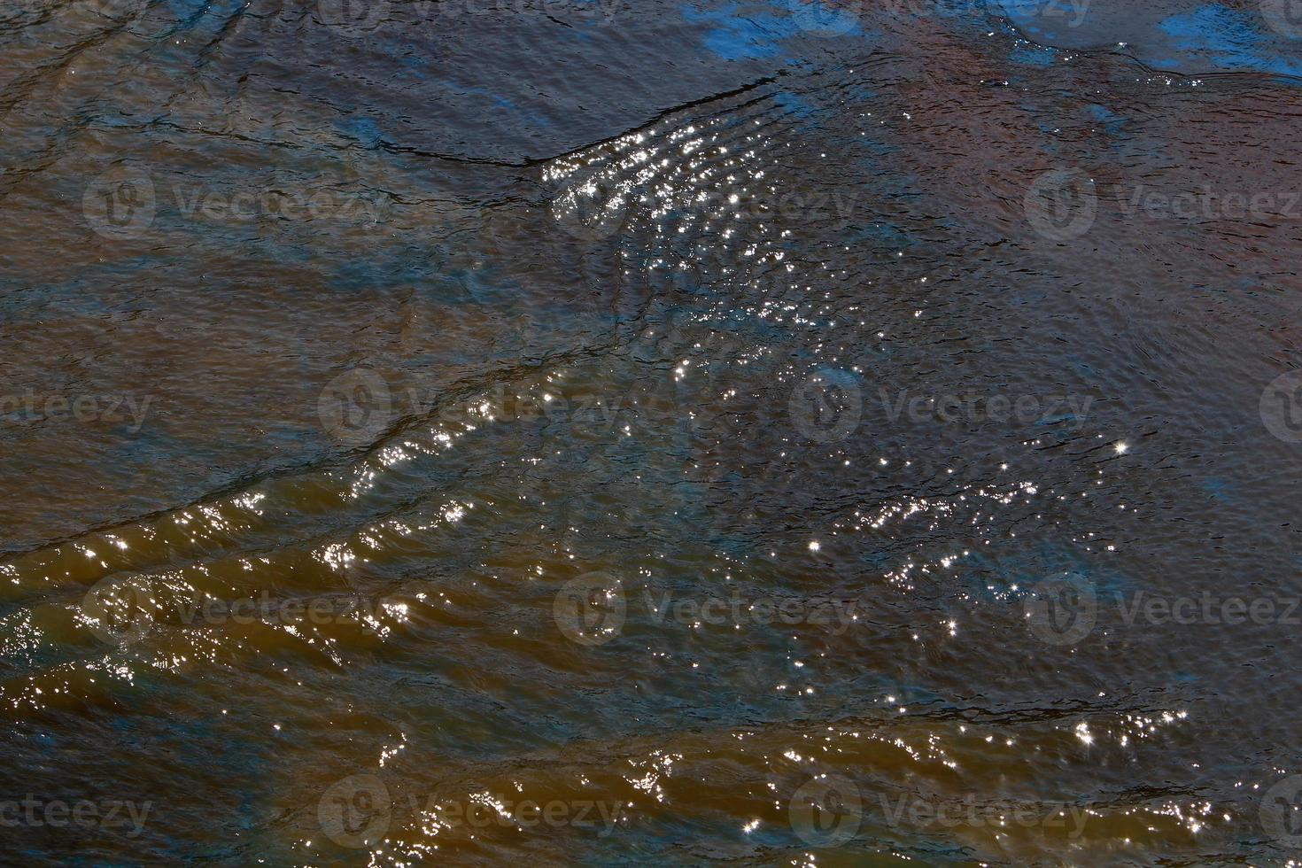 The color of the water in the mediterranean sea in shallow water photo