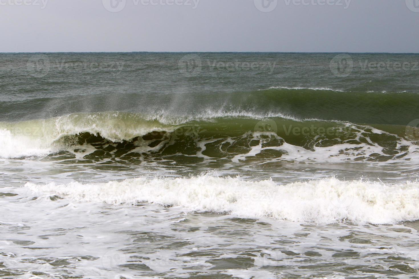 The color of the water in the mediterranean sea in shallow water photo