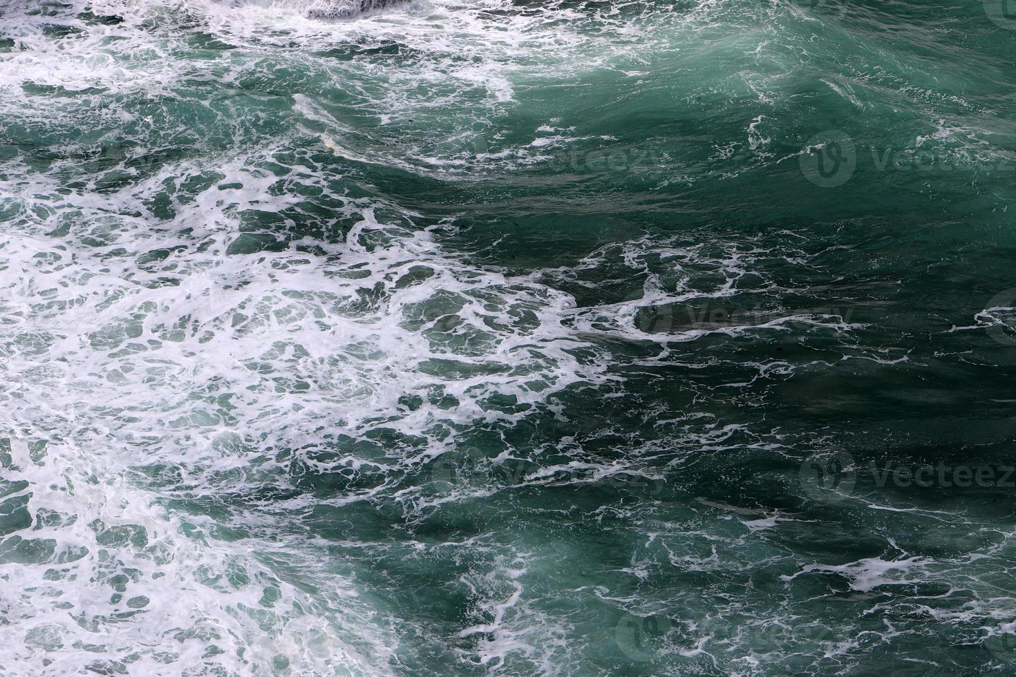 The color of the water in the mediterranean sea in shallow water photo