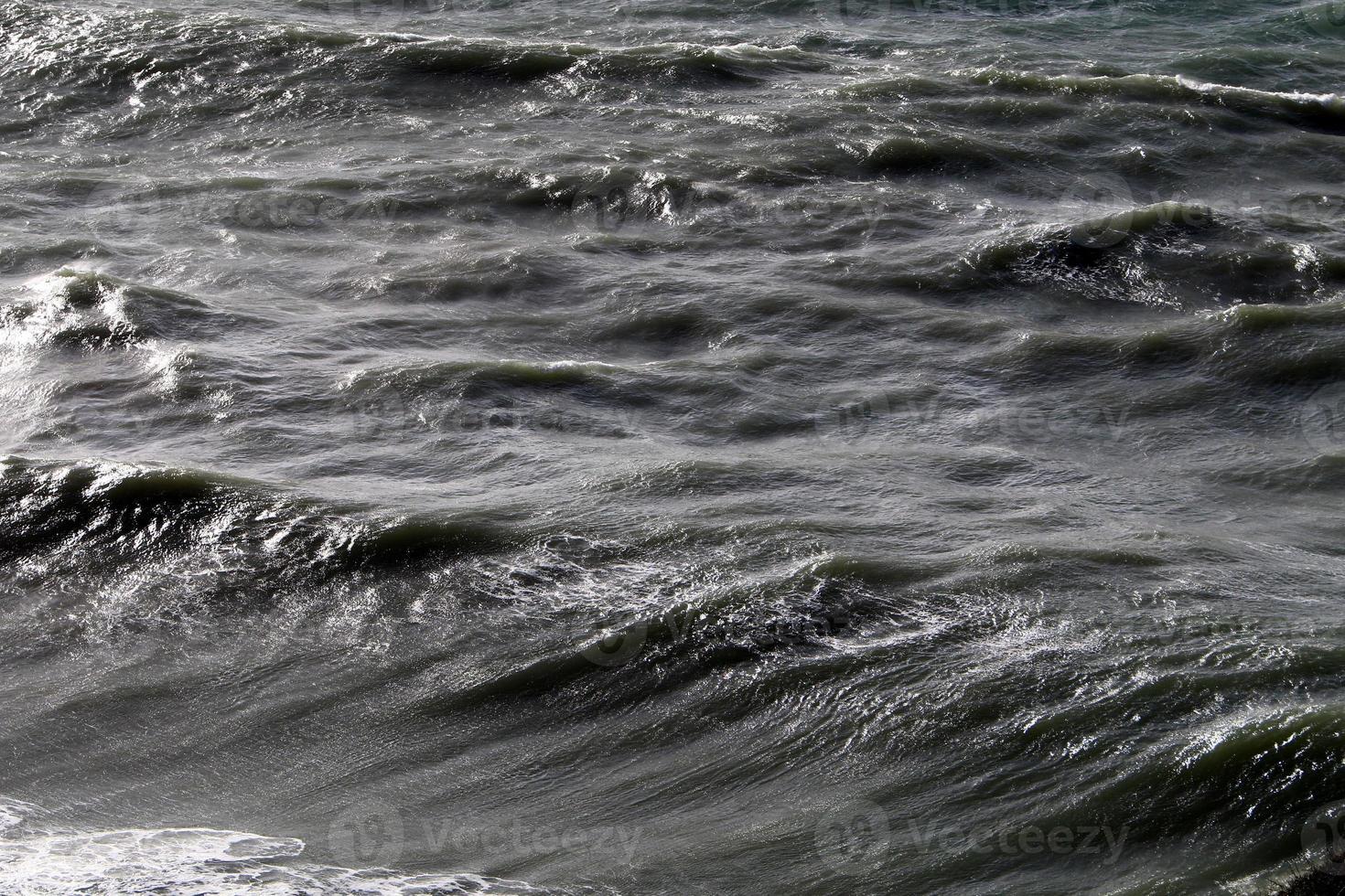 The color of the water in the mediterranean sea in shallow water photo