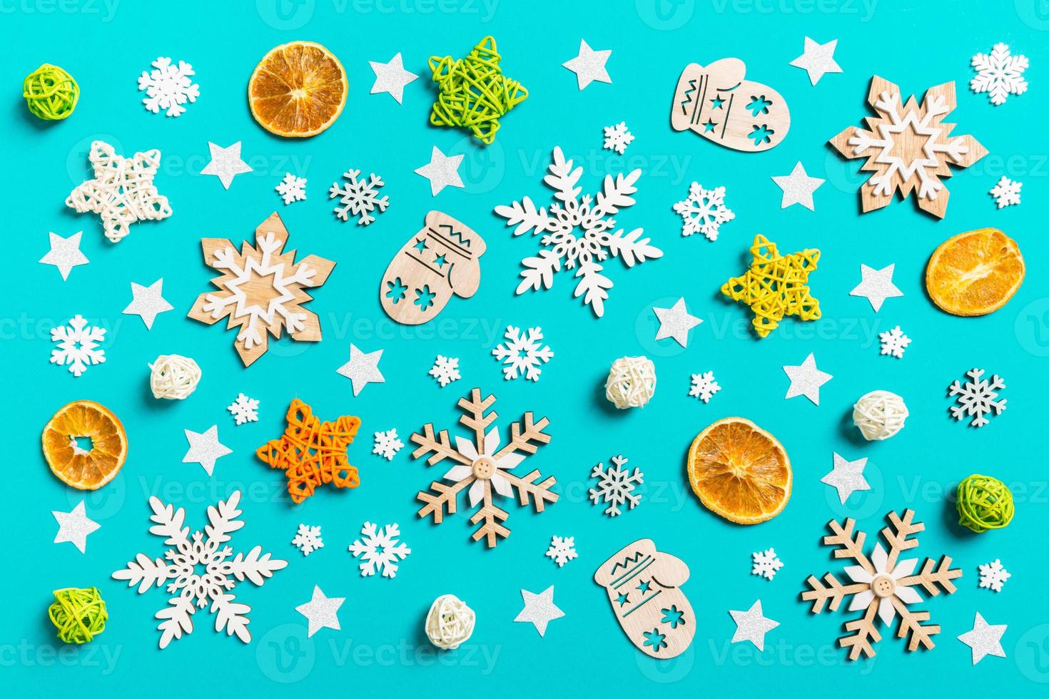 Top view of blue background with New Year toys and decorations. Christmas time concept photo