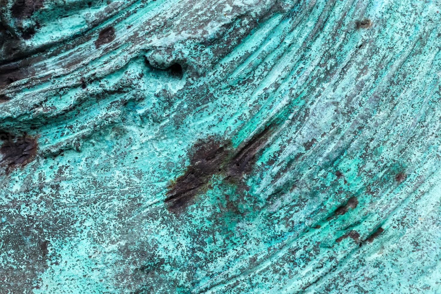 Detailed close up view on aged concrete walls with cracks and lots of structure photo