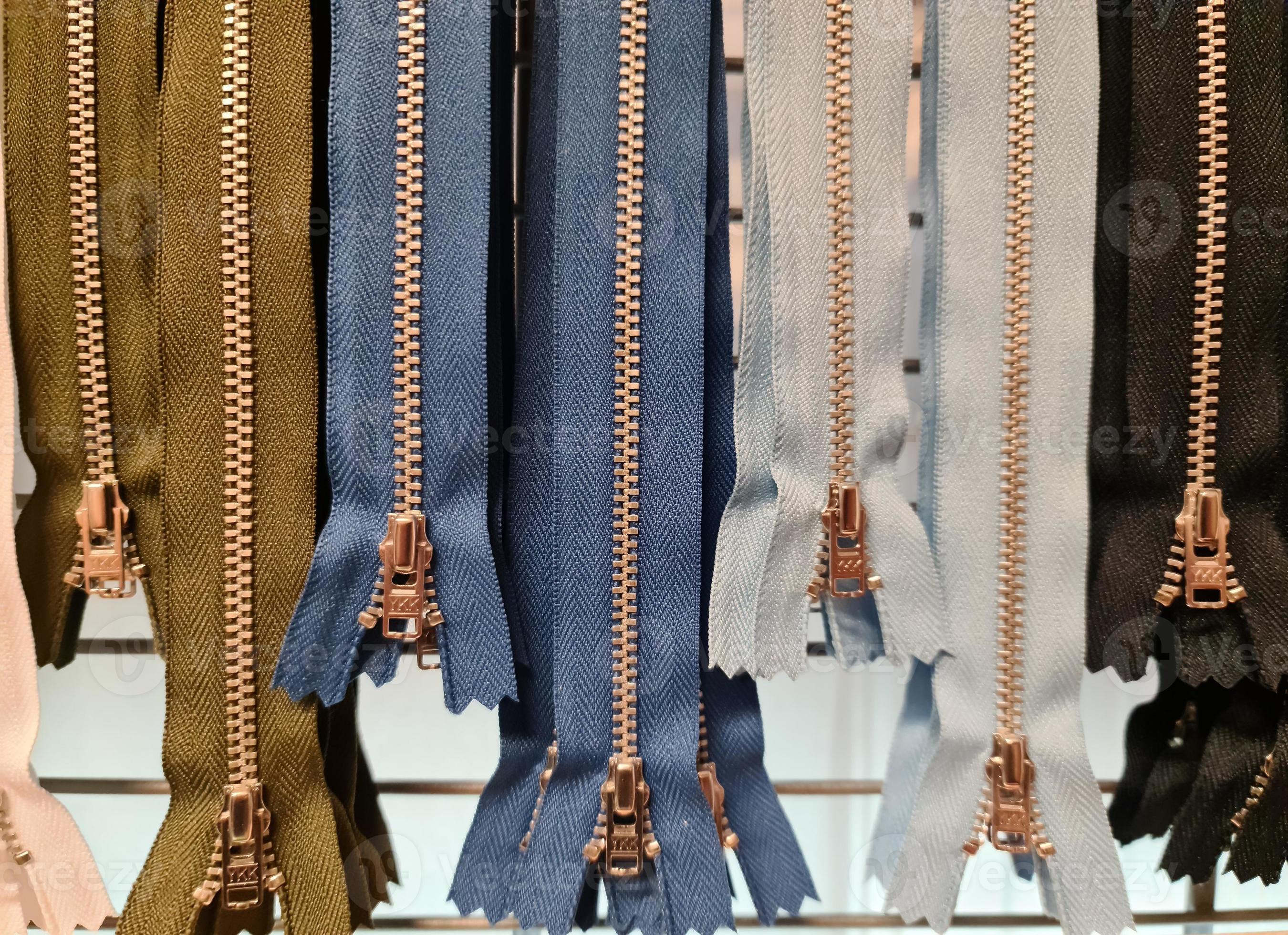 Many zips in different colours. 13161716 Stock Photo at Vecteezy