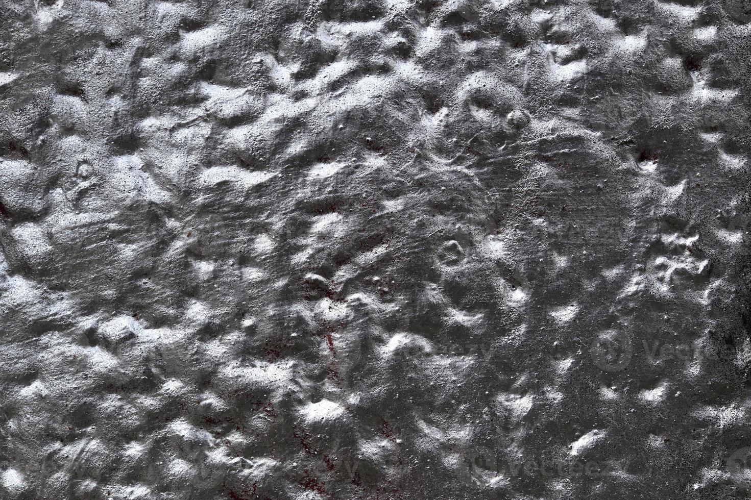 Detailed view on aged concrete walls with cracks and a lot of structure in high resolution photo