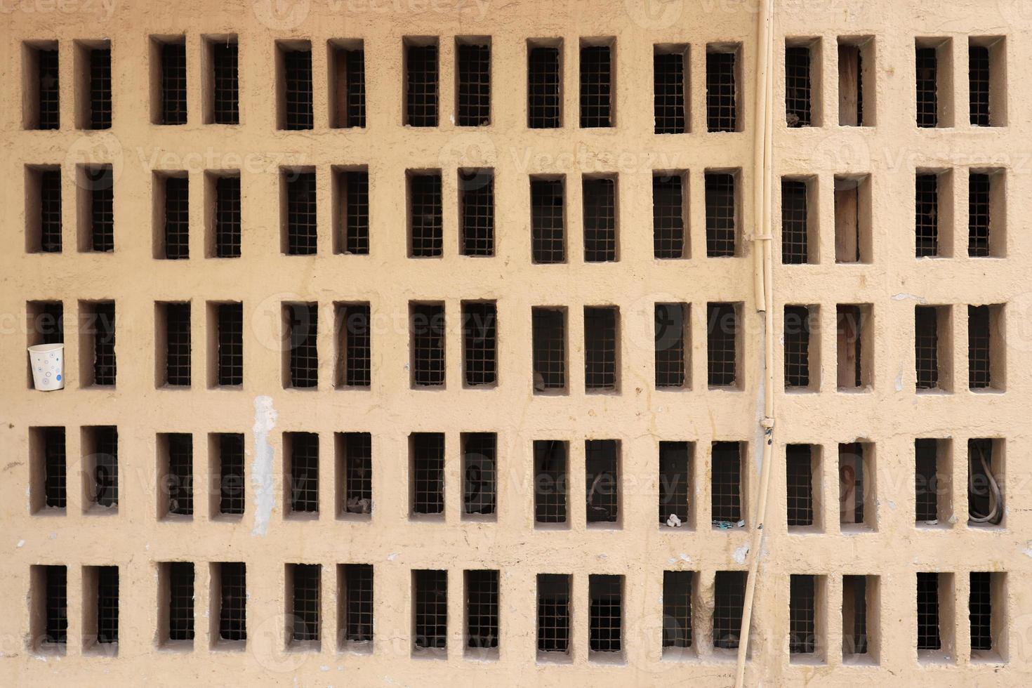 Detailed view on aged concrete walls with cracks and a lot of structure in high resolution photo
