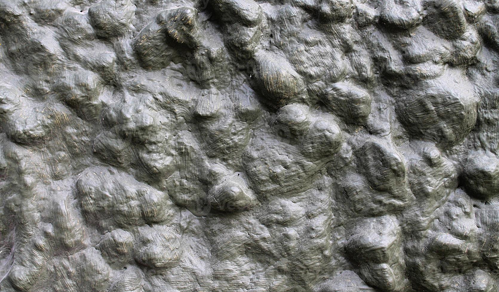 Detailed view on aged concrete walls with cracks and a lot of structure in high resolution photo