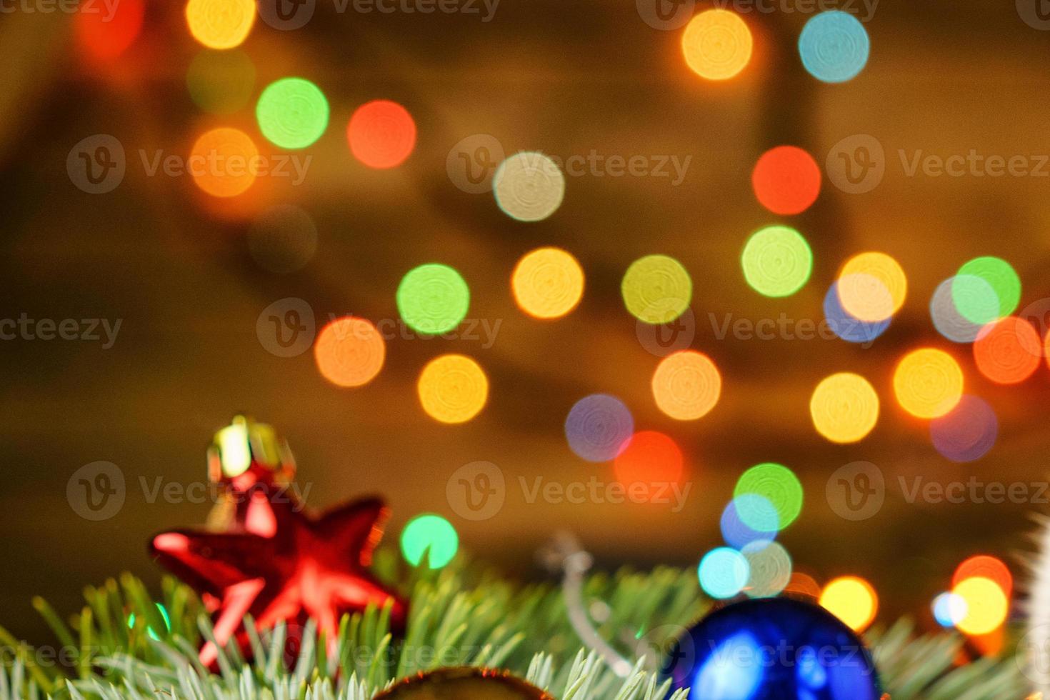 Christmas balls on bokeh background photo