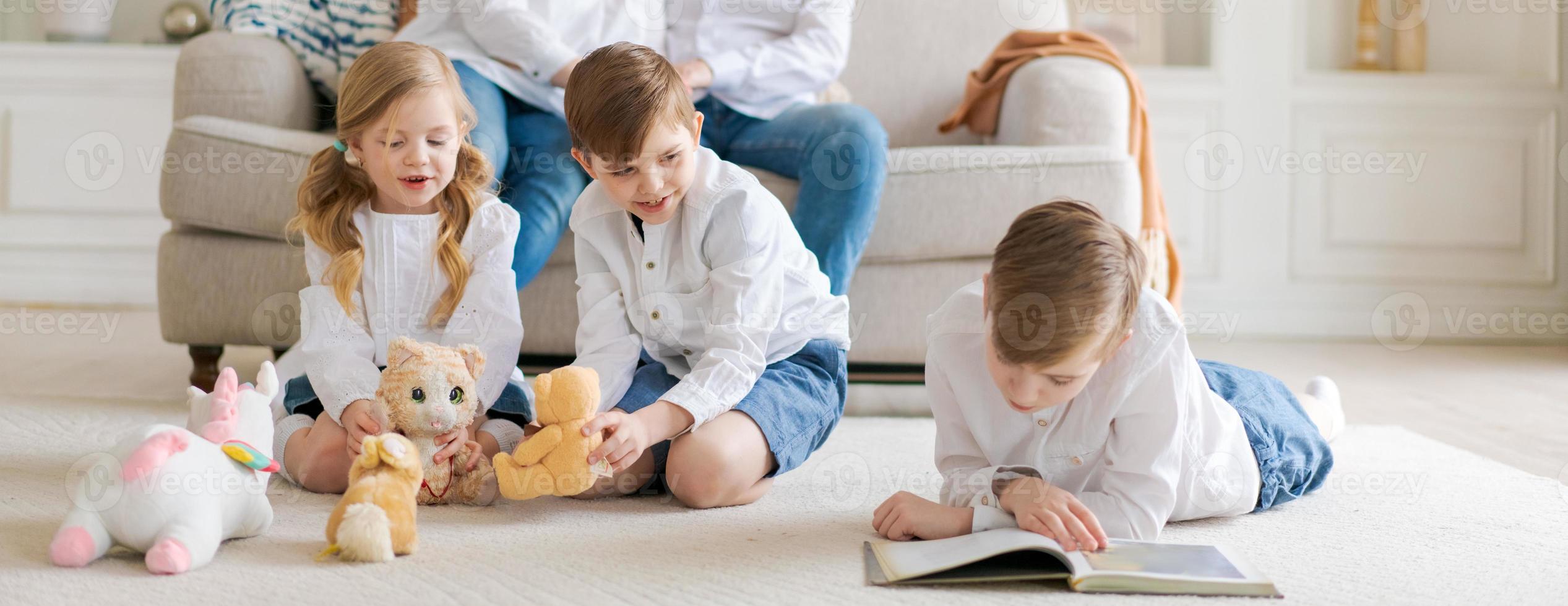 Happy young caucasian family resting in a new cozy design home on weekends. photo