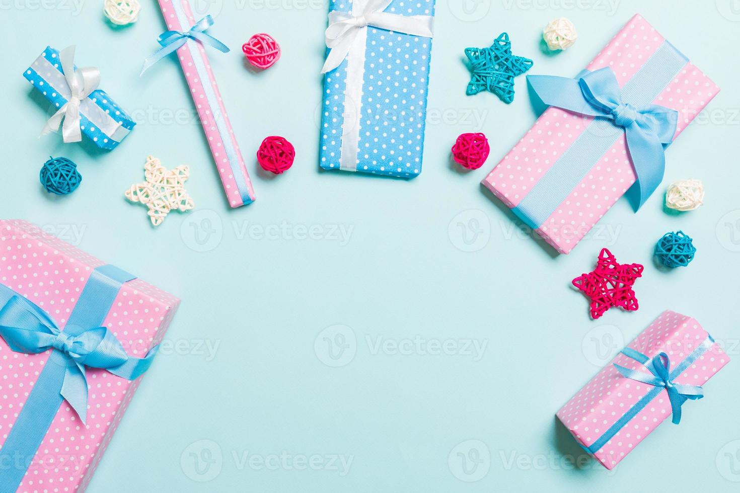 Top view of Christmas decorations on blue background. New Year holiday concept with copy space photo