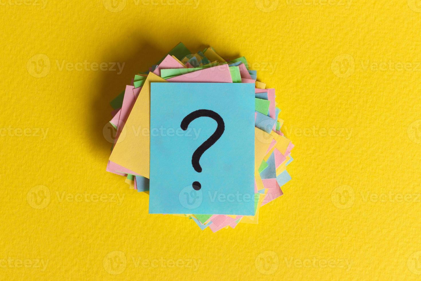 colorful question marks written reminders tickets. ask or business concept photo