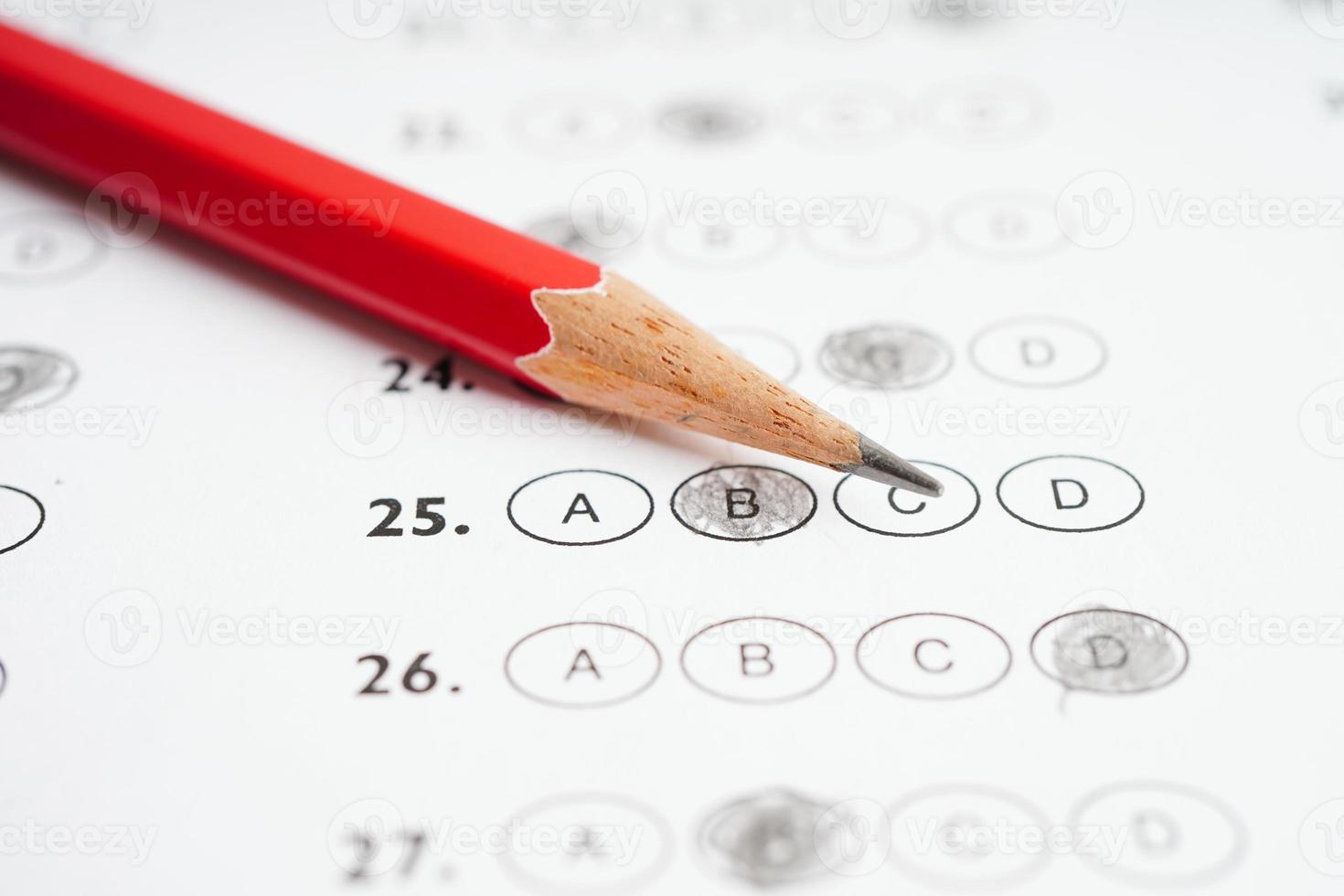 Answer sheets with pencil drawing fill to select choice, education concept. photo