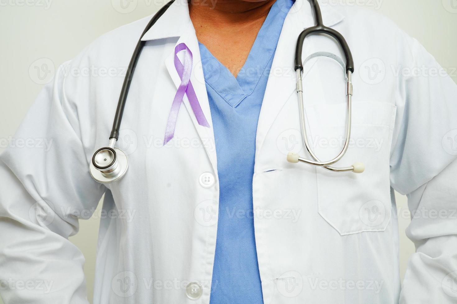 Asian woman doctor with purple ribbon, World Pancreatic Cancer day or World Alzheimer day. photo