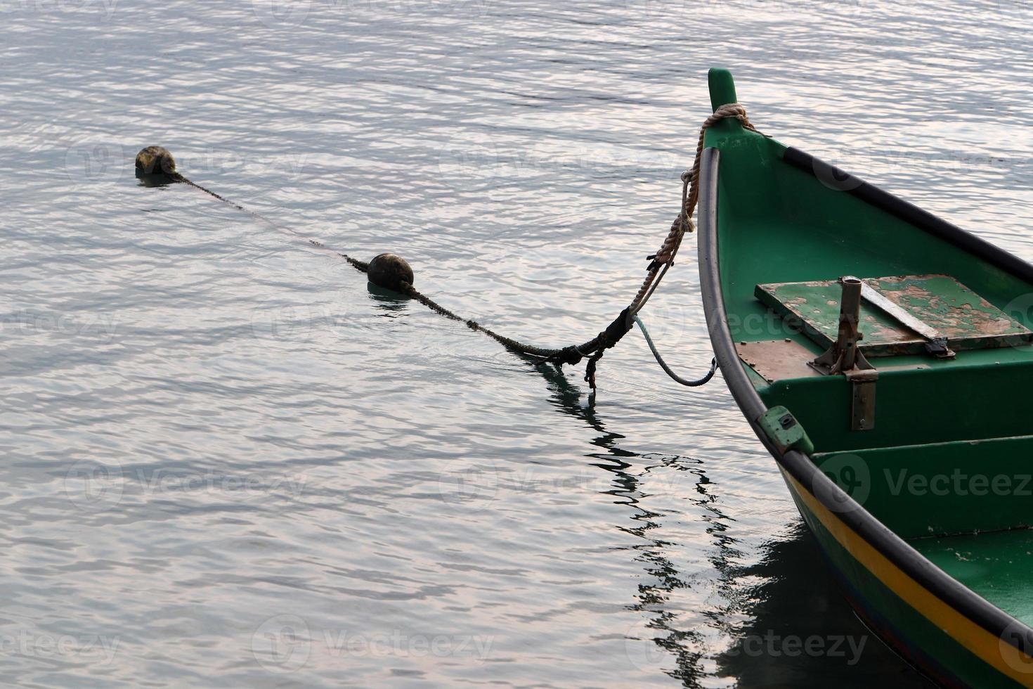 Berth on the shore for mooring boats and yachts. photo