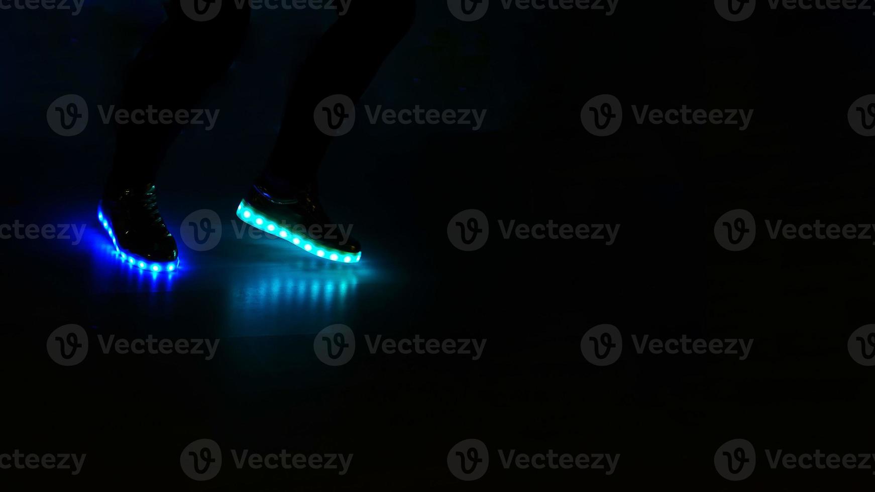 Fashionable sneakers with LED lighting. photo