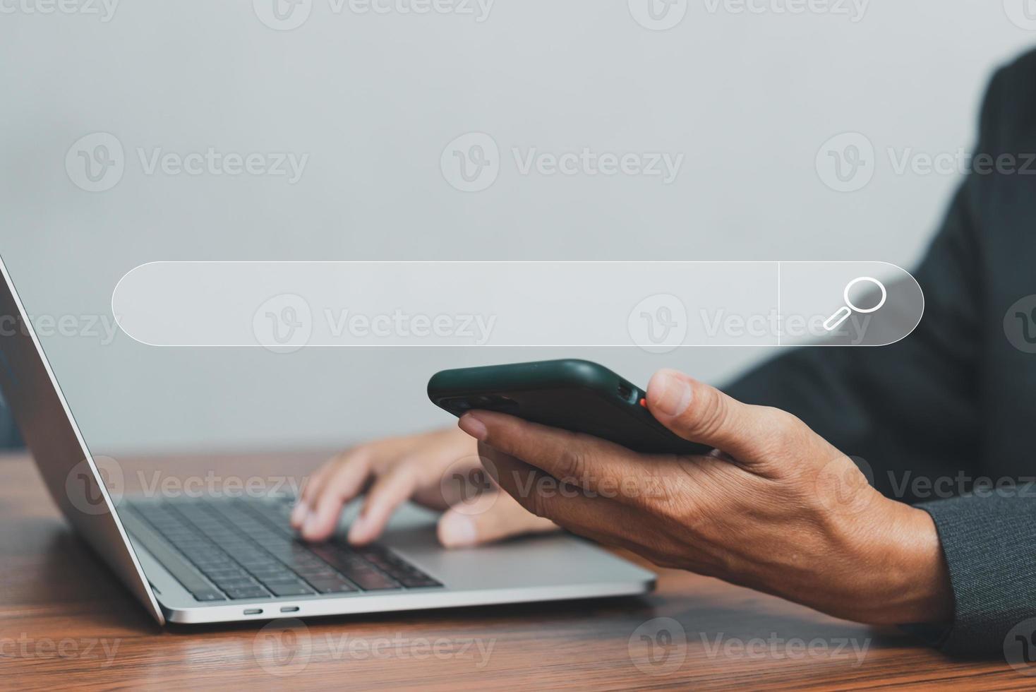 man hand searching browsing for information internet data Technology on computer keyboard notebook.SEO Search Engine Optimization. photo