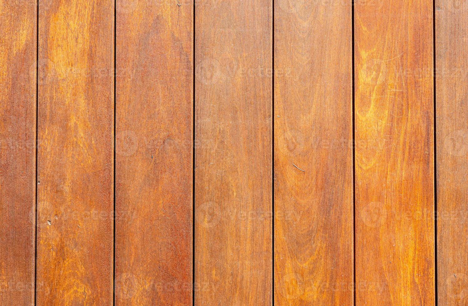 Vertical brown wooden planks texture background made of dark natural wood in grunge style. Copy space for design or text. photo