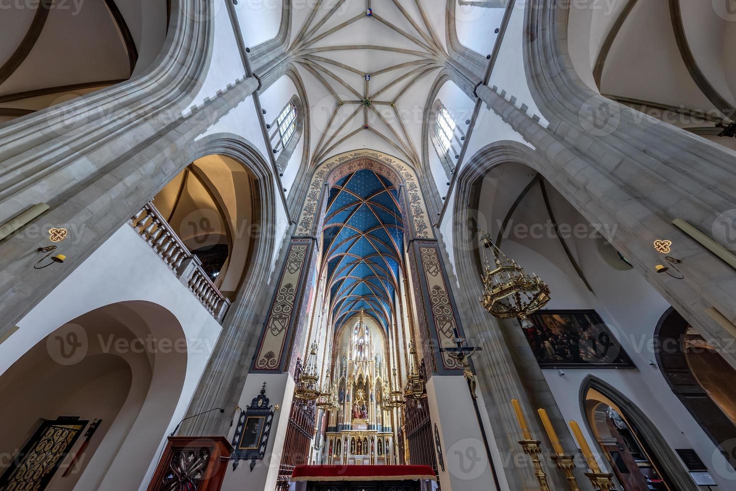 interior dome and looking up into a old gothic catholic  church ceiling photo