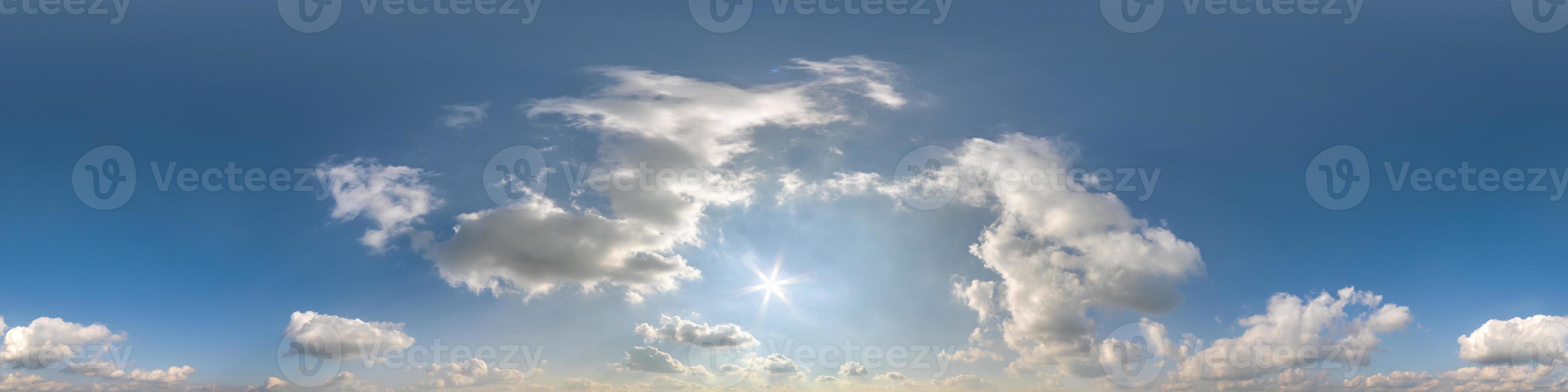 evening blue sky with beautiful clouds as seamless hdri 360 panorama view with zenith for use in 3d graphics or game development as sky dome or edit drone shot photo