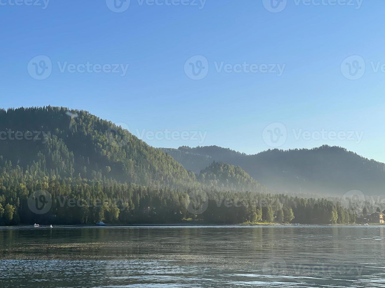 Lake Teletskoye at sunset. Altai, Russia. photo