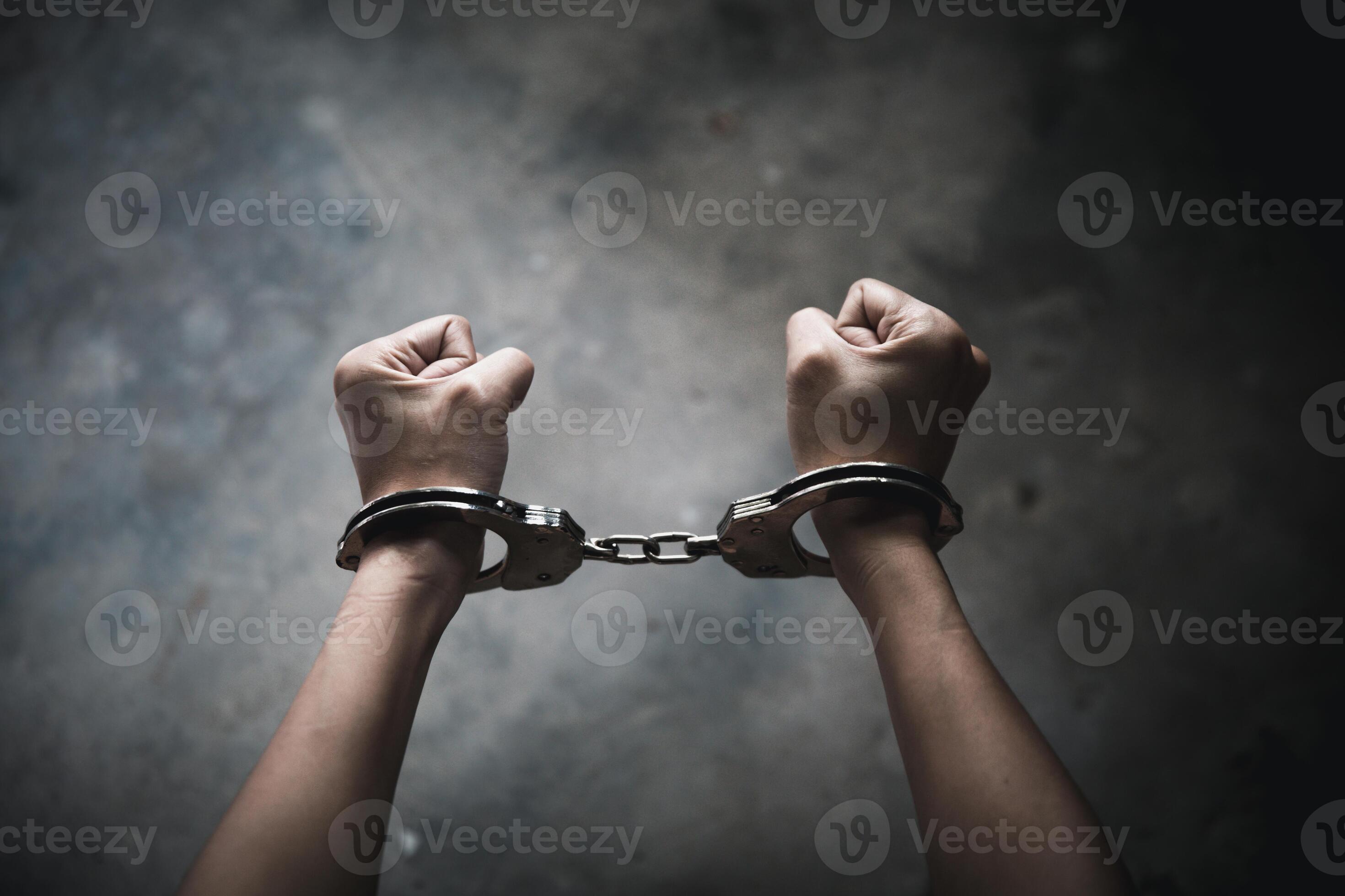 woman hands in handcuffs, human trafficking Concept, stop violence