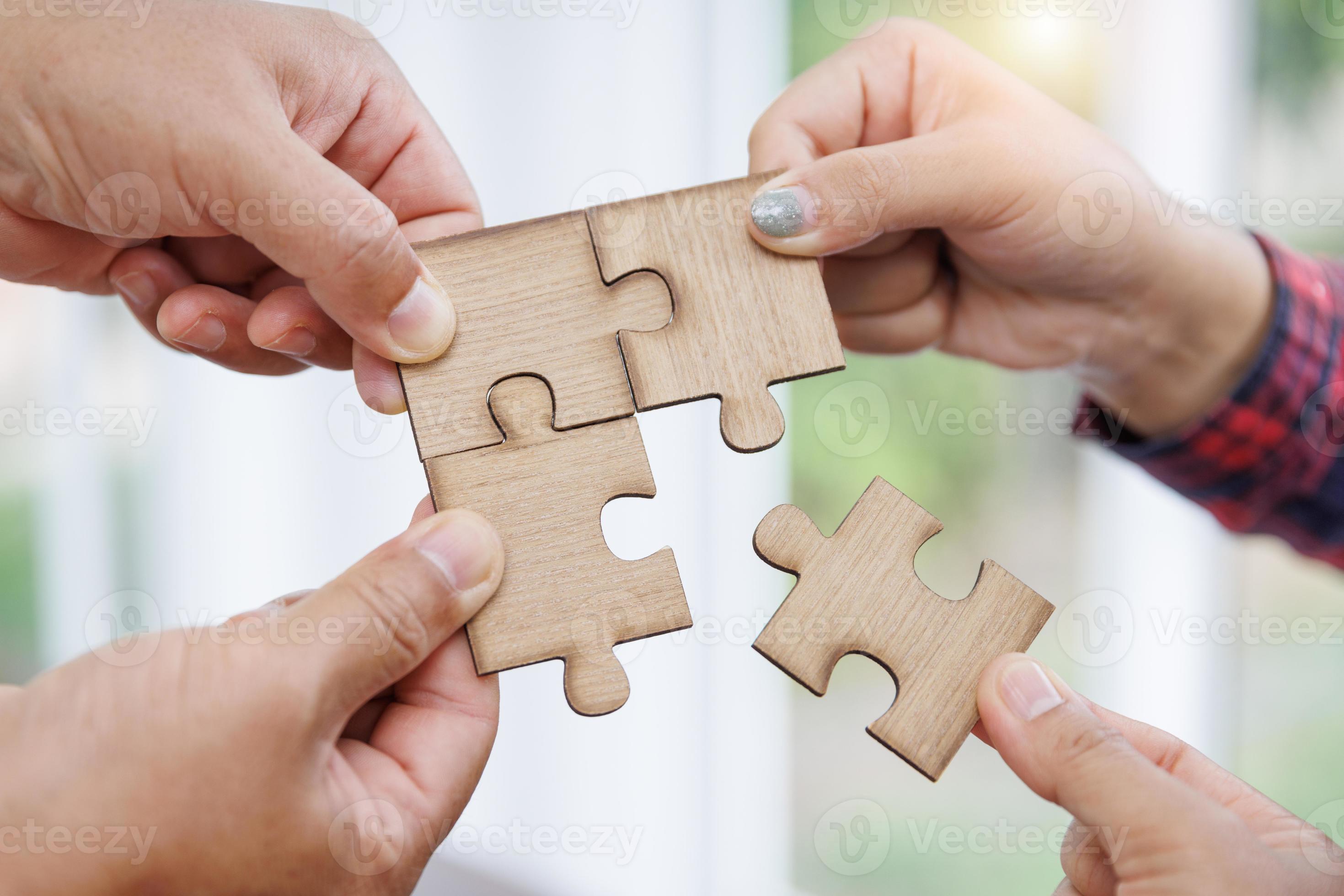 Group of business people assembling jigsaw puzzle and represent team support  and help concept 13186331 Stock Photo at Vecteezy