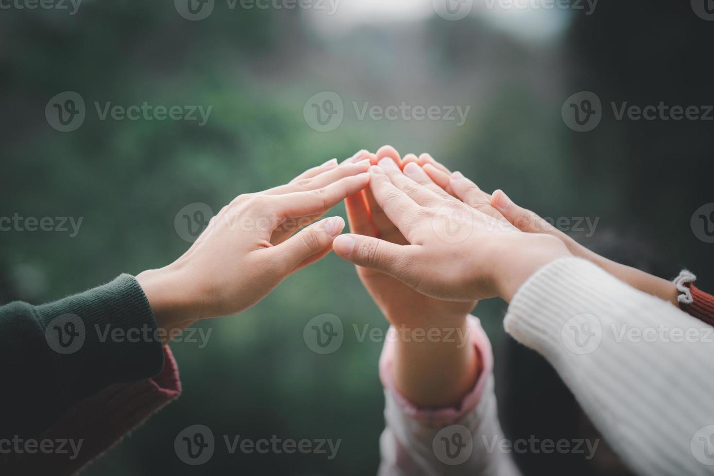 Teamwork high five as team together hands air greeting power tag team. Collaboration Business Team success concept. photo