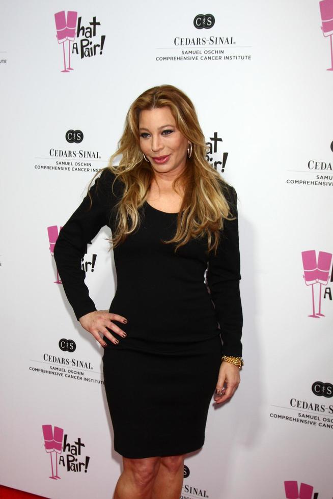 LOS ANGELES, APR 13 - Taylor Dayne arrives at the What A Pair  Benefit Concert at the The Broad Stage on April 13, 2013 in Santa Monica, CA photo
