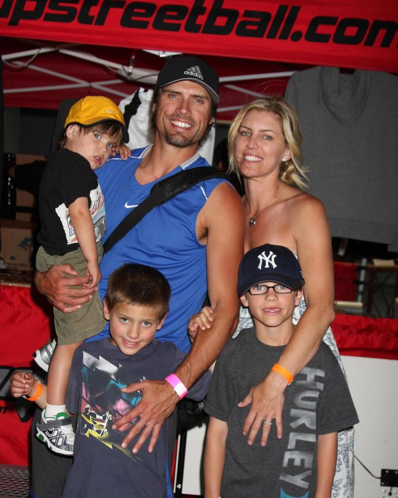 LOS ANGELES - MAY 1 - Joshua Morrow, with wife Tobe, and sons Cash, Crew, and Cooper arriving at the 1st Annual Ball Up Celebrity Streetball Game at Cal State Northridge s Matadome Stadium on May 1, 2011 in Northridge, CA photo