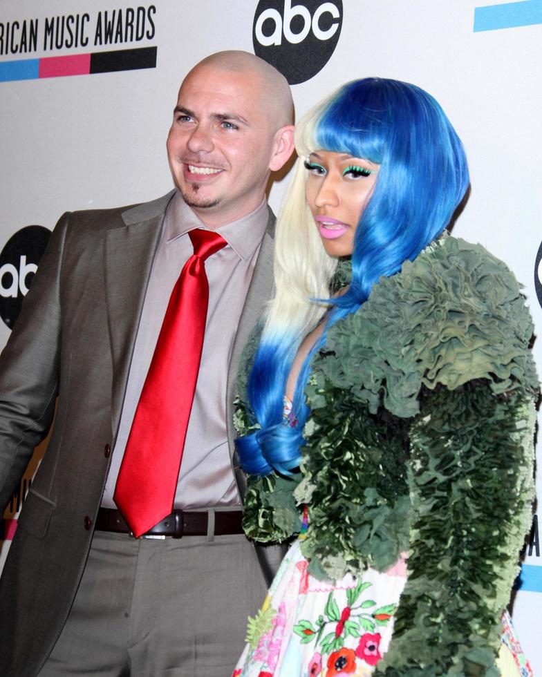 LOS ANGELES - OCT 11 - Pitbull Nicki Minaj arriving at the 2011 American Music Awards Nominations Press Conference at the JW Marriott Los Angeles at L.A. LIVE on October 11, 2011 in Los Angeles, CA photo