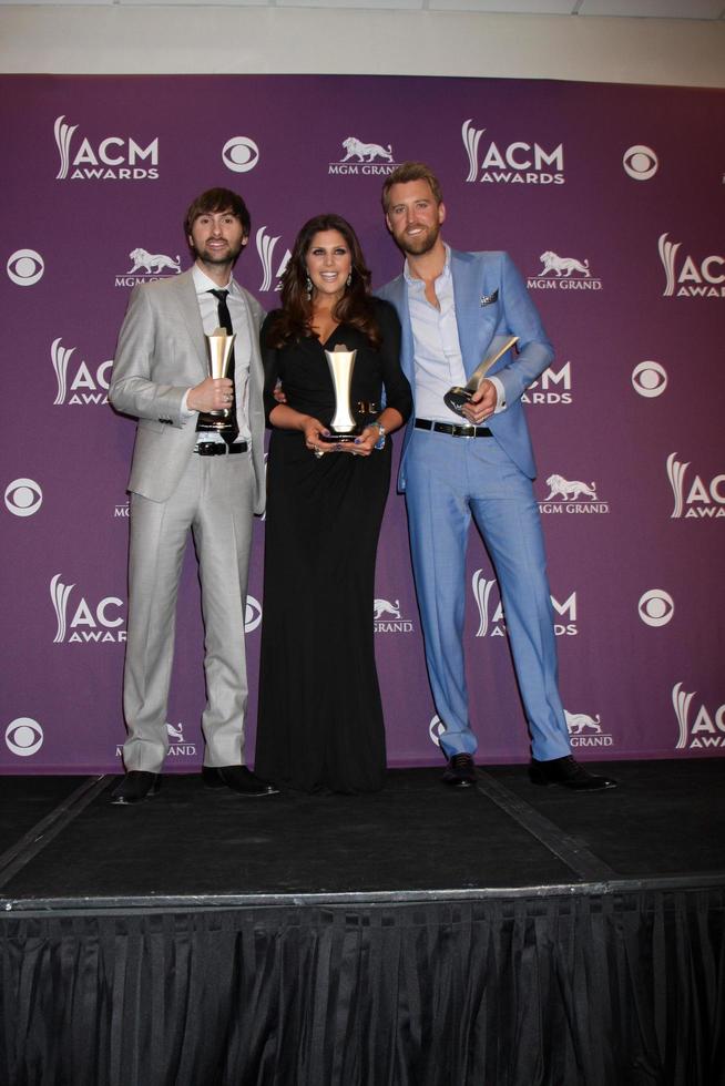 LAS VEGAS - APR 1 - Lady Antebellum in the press room at the 2012 Academy of Country Music Awards at MGM Grand Garden Arena on April 1, 2010 in Las Vegas, NV photo