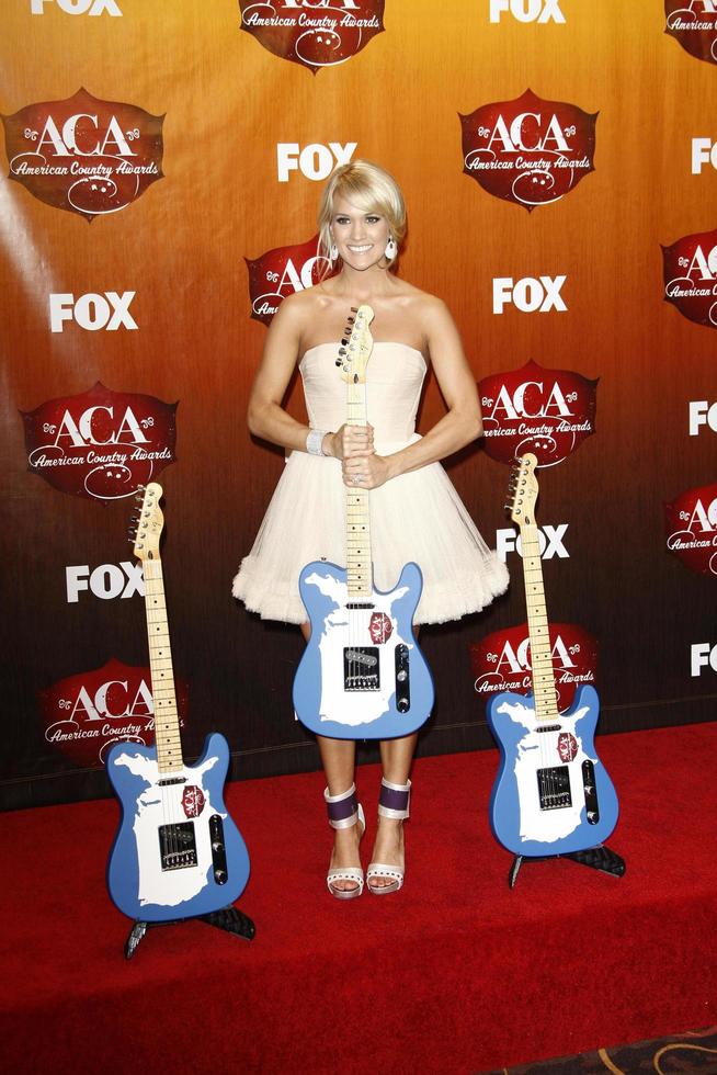 LOS ANGELES - DEC 5 - Carrie Underwood in the Press Room of the American Country Awards 2011 at MGM Grand Garden Arena on December 5, 2011 in Las Vegas, NV photo