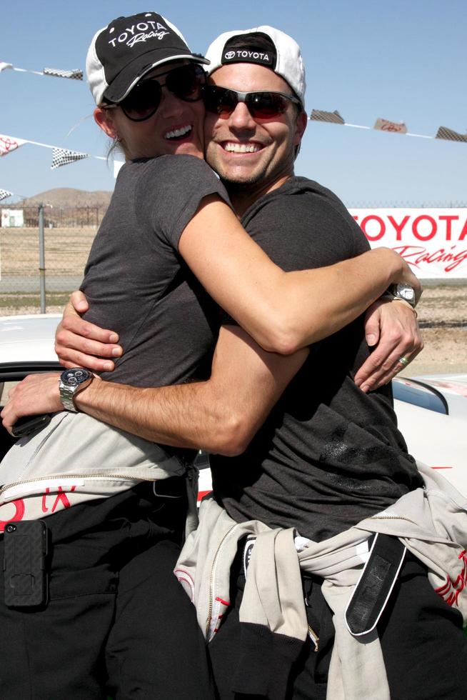 LOS ANGELES - MAR 15 - Tricia Helfer, Colin Egglesfield at the Toyota Grand Prix of Long Beach Pro-Celebrity Race Training at Willow Springs International Speedway on March 15, 2014 in Rosamond, CA photo