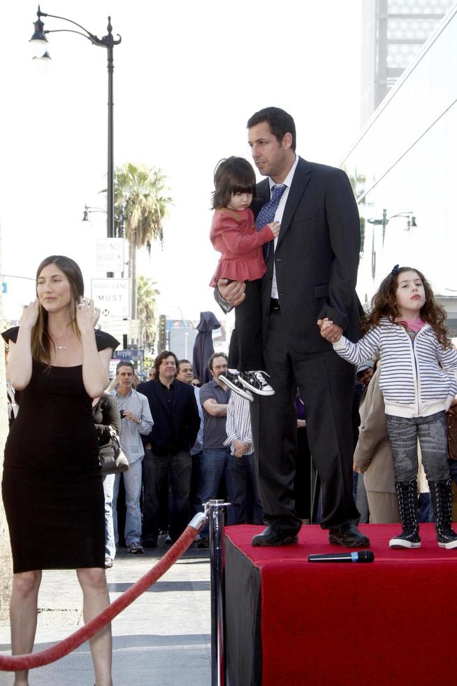 LOS ANGELES - FEB 1 - Adam Sandler, with daughters Sunny and Sadie at the Adam Sandler Hollywood Walk of Fame Star Ceremony at W Hotel on February 1, 2011 in Hollywood, CA photo