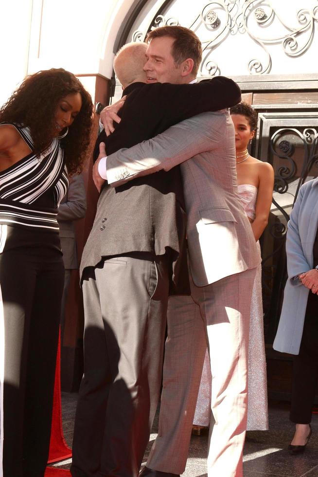LOS ANGELES - DEC 4 - Peter Krause, Ryan Murphy, Angela Bassett at the Ryan Murphy Star Ceremony on the Hollywood Walk of Fame on December 4, 2018 in Los Angeles, CA photo
