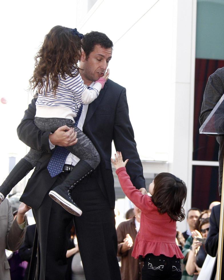 LOS ANGELES - FEB 1 - Adam Sandler, with daughters Sunny and Sadie at the Adam Sandler Hollywood Walk of Fame Star Ceremony at W Hotel on February 1, 2011 in Hollywood, CA photo