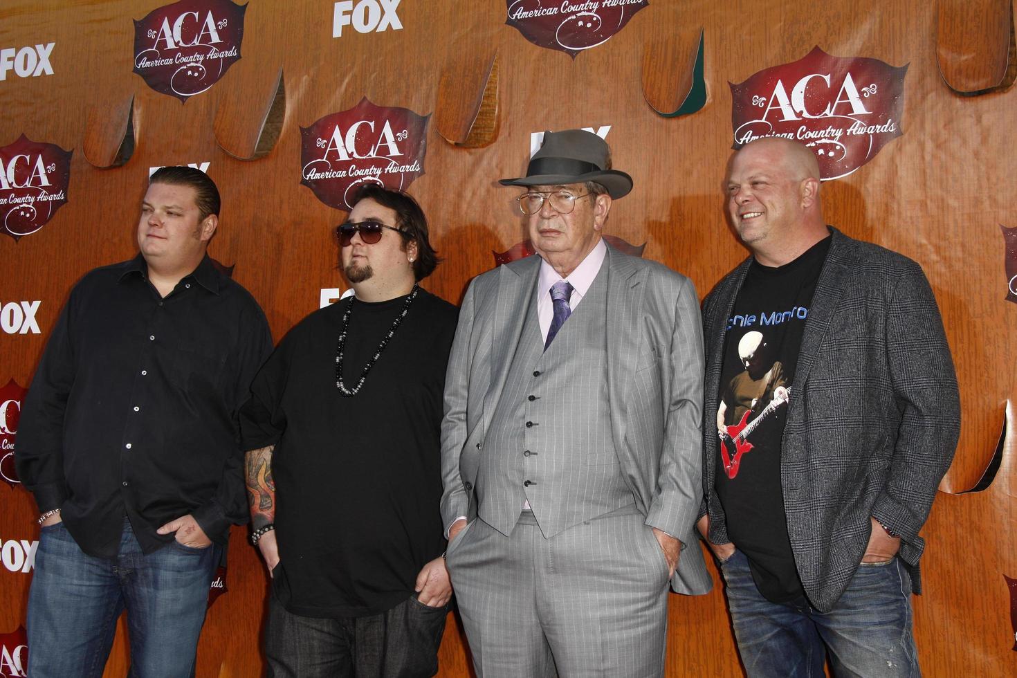 LOS ANGELES - DEC 5 - Corey Harrison, Austin Chumlee Russell, Richard Harrison and Rick Harrison of Pawn Stars arrives at the American Country Awards 2011 at MGM Grand Garden Arena on December 5, 2011 in Las Vegas, NV photo