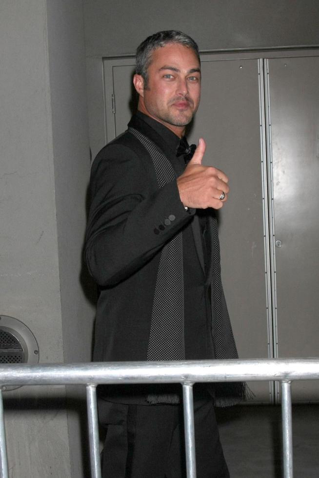 LOS ANGELES - OCT 3 - Taylor Kinney at the American Horror Story - Hotel Premiere Screening at the Regal 14 Theaters on October 3, 2015 in Los Angeles, CA photo