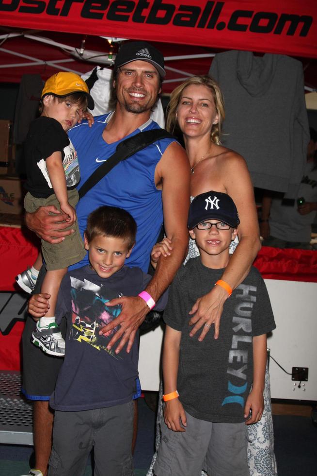 LOS ANGELES - MAY 1 - Joshua Morrow, with wife Tobe, and sons Cash, Crew, and Cooper arriving at the 1st Annual Ball Up Celebrity Streetball Game at Cal State Northridge s Matadome Stadium on May 1, 2011 in Northridge, CA photo