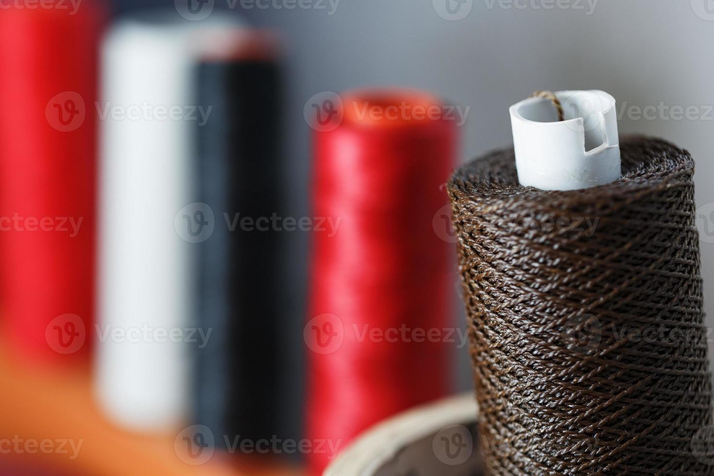 Thread spools for sewing are used in the fabric and textile industries. photo
