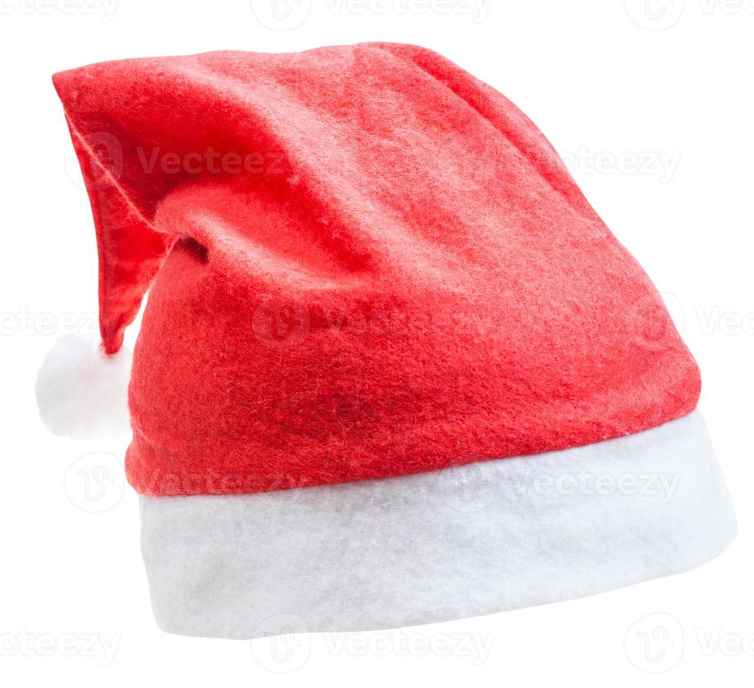 sombrero rojo tradicional de santa aislado en blanco foto
